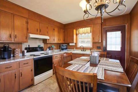 The kitchen exits to the back yard.