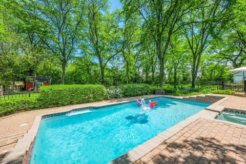 Private heated saltwater pool and hot tub (surrounded by a fence for safety)