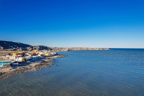 Calm waters, panoramic coastlines perfect for paddle boarding, kayaking, and exploring.
