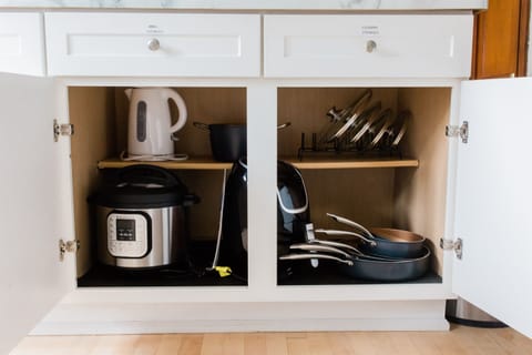 Fully equipped kitchen; pots, pans, baking ware, oven mitts, and many more.