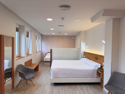 Classic Quadruple Room | Individually furnished, desk, laptop workspace, free WiFi