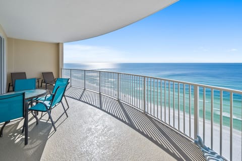 Relax on your private oceanfront balcony with stunning sea views, comfortable seating, and endless blue horizons stretching before you.