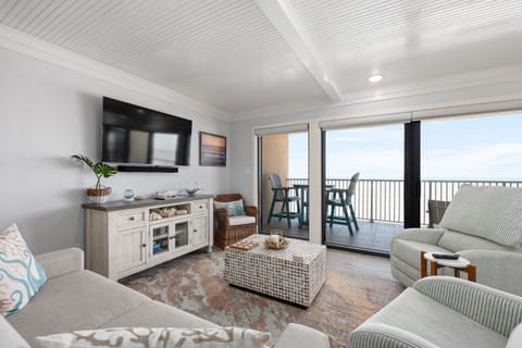 Enjoy the picturesque view from the large windows in the living area.