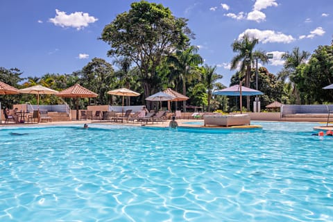 Outdoor pool, pool umbrellas, sun loungers