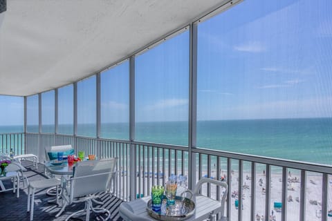Enjoy a snack on the screened balcony then head down to the private beach