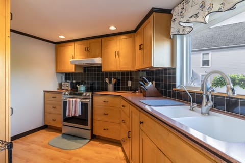 Well stocked kitchen to cook your meals.