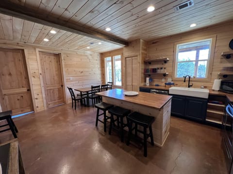 Bar style seating perfect for the kids who want to pull up and help with dinner!