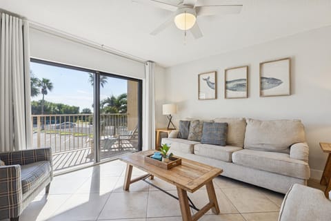 Stylish living area with coastal charm and open, airy vibes.