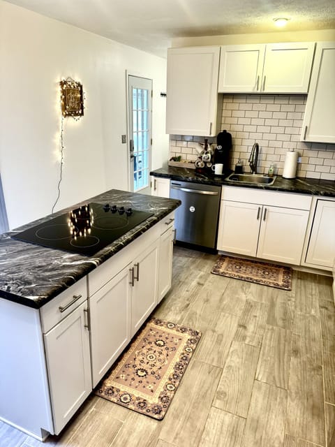 Kitchen fully stocked with everything you need to make a nice meal.