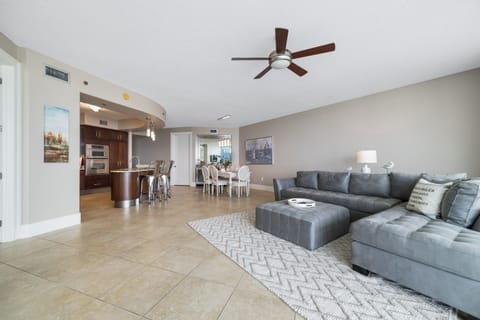 This thoughtfully designed living space maximizes natural light and integrates seamlessly with the surrounding environment. The open-concept layout and expansive windows create a bright and airy atmosphere.