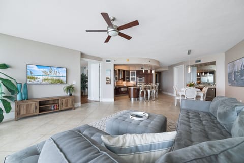 A light-filled living space with captivating views. This inviting room offers a perfect blend of comfort and style, creating a welcoming atmosphere for all.
