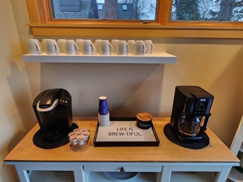 Buffet with 14 cup drip brewer, Dunkin Donuts coffee pods and a Keurig