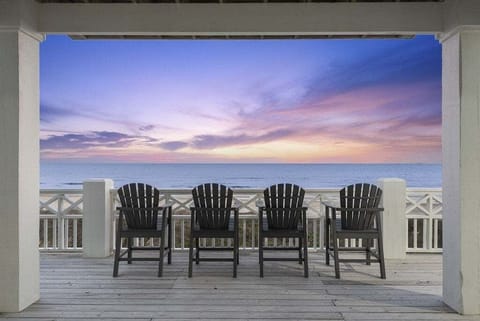 Welcome to Paradise Pointe! Private beachfront balcony with Adirondack chairs and breathtaking Gulf sunset views.