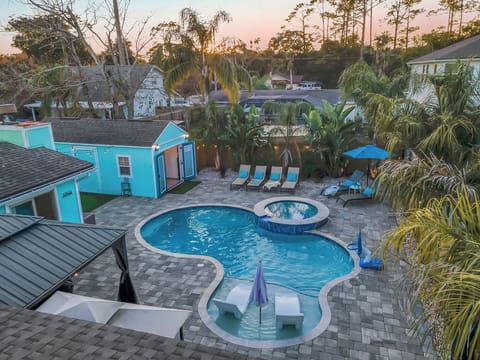 Your own tropical retreat - heated pool, hot tub, cabana lounge, and a cozy guest cottage just steps from the main house.