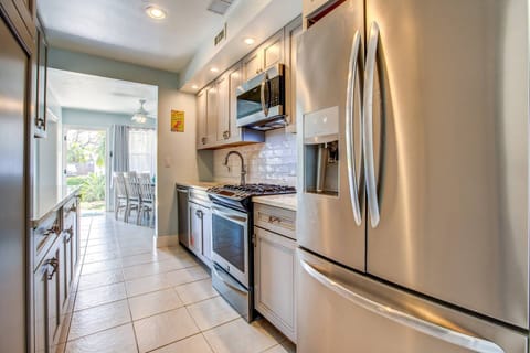 This updated kitchen boasts stainless steel appliances and elegant granite countertops, adding both style and functionality to your culinary experienc