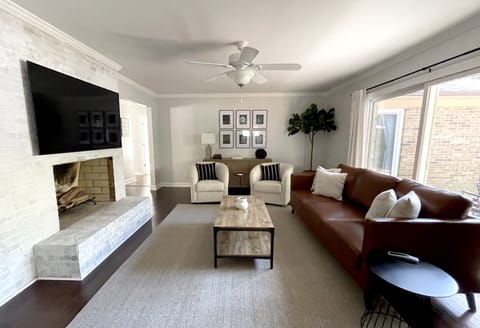 Living room with 65" T.V. 