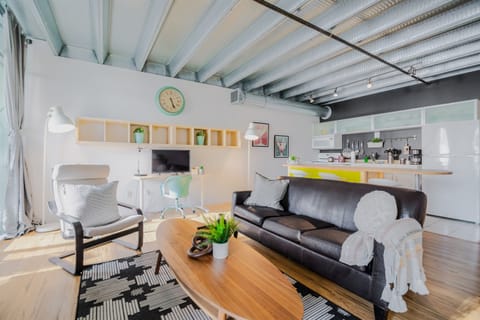 Living Room: After a long day exploring the city or mall, unwind in this cozy living room with your favorite Netflix show or music.