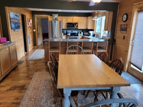 dinning room table looking towards the kitchen 
