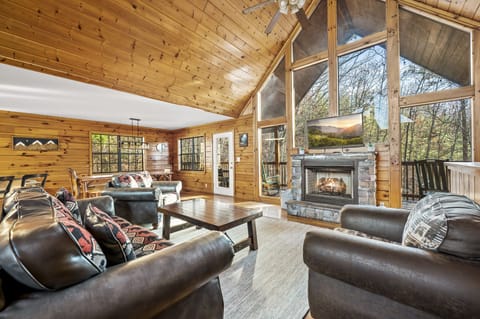 Great room w/ cozy fireplace that flows out to the back deck!