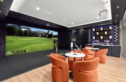 Brand new speakeasy-style clubhouse featuring a state-of-the-art TrackMan simulator, full bar setup, kegerator, ice machine, and curated lounge seating - a private, elevated space designed for late-night golf, cocktails, and unforgettable gatherings.