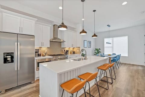 A different view of the main level kitchen and dining area.