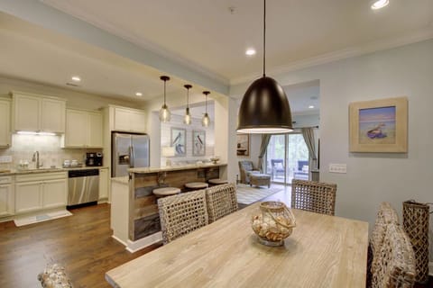 A beach themed dining room and table that accommodates up to six.