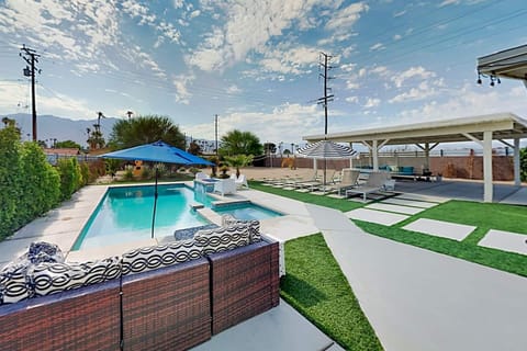 Gorgeous pool and spa with mountain view, multiple seating area options