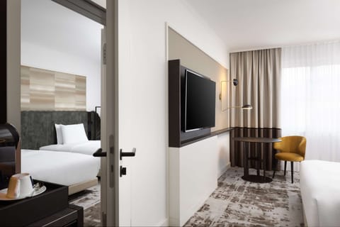 In-room safe, desk, iron/ironing board, free cribs/infant beds