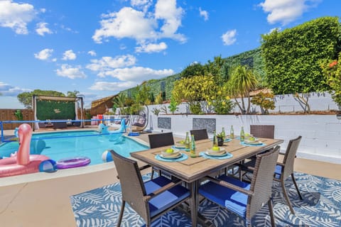 Outdoor dining with scenic pool views!