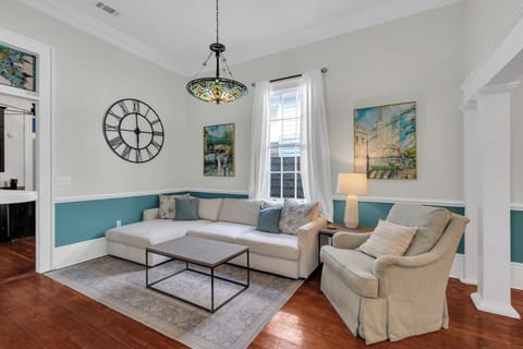 Bright sitting room w/ modern furnishings & plenty of natural light to start your day right.
