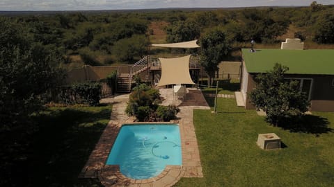Aerial view of outdoor kitchen and entertainment area.