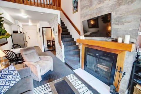 A great 3 seater sofa  in the living room and comfortable recliner. Relax in front of the wood burning fire after a long day on the hill