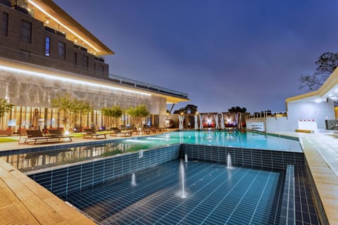 Outdoor pool, open 6:00 AM to 6:00 PM, free cabanas, pool umbrellas