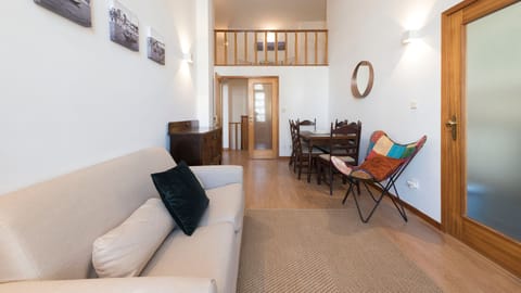 Relax in the bright, open-plan living area, where natural light pours in, offering comfort and a connection to the mezzanine above.
#LivingRoom #Spacious #LovelyStay