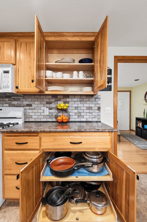 Dishes, silverare and pots and pans