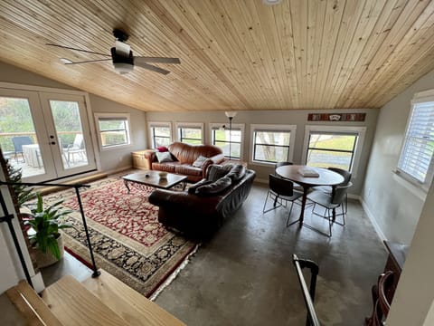 Bonus room with smart TV, game table with games and puzzles, desk area
