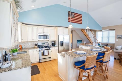 Fully equipped luxury kitchen with oversized island and seating
