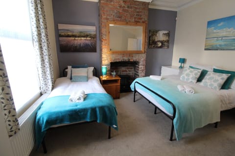 Laptop workspace, free WiFi, bed sheets