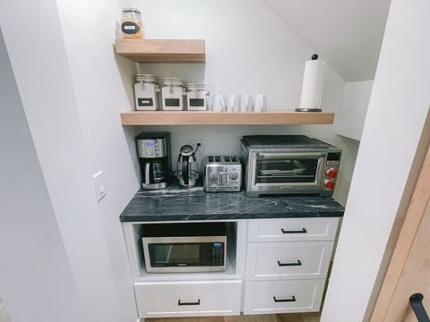 Kitchen Appliances in hideaway pantry