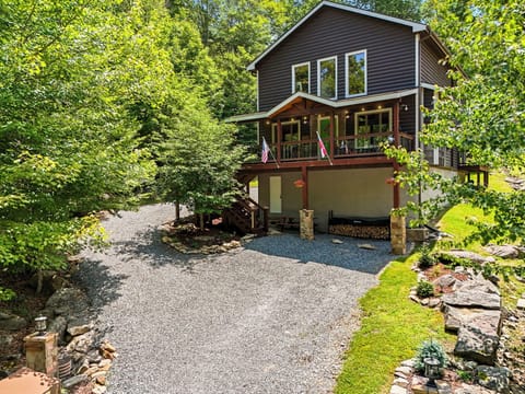 CREEKS FLANK THE LEFT AND RIGHT SIDES OF THE PROPERTY; UPPER AND LOWER PARKING