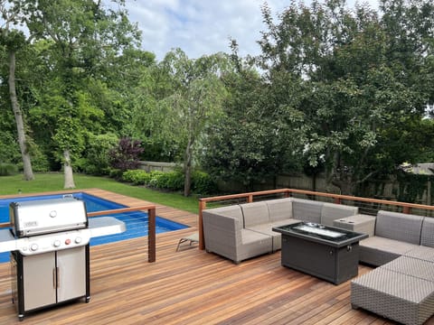 All new hardwood deck with non-slip surface around the pool.  Weber grill