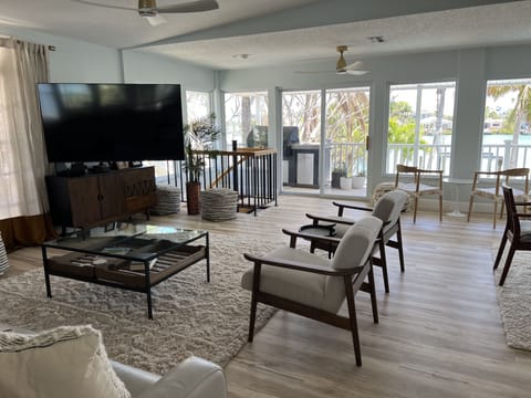 Modern coastal design with giant TV