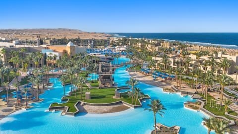 2 outdoor pools, lifeguards on site