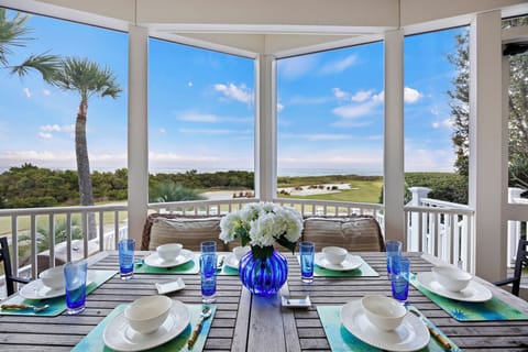 Enjoy the Incredible Ocean Views while eating appetizers on the screened porch.