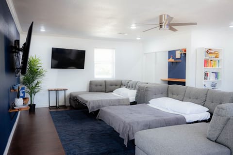 Each sectional sofa includes a queen sized pull-out bed.