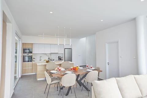 Dining area with table and chairs to seat 6 people