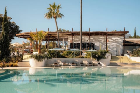 Indoor pool, 3 outdoor pools, open 10:00 AM to 7:00 PM, pool umbrellas