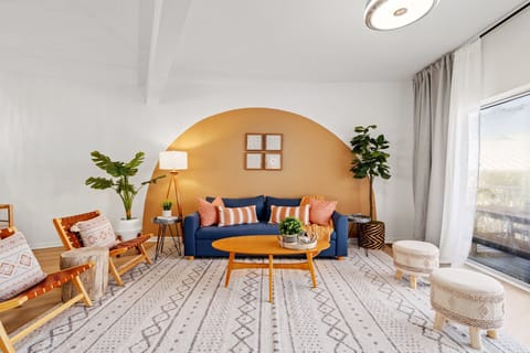 Beautifully decorated living room- BOHO Inspired with a balcony to relax