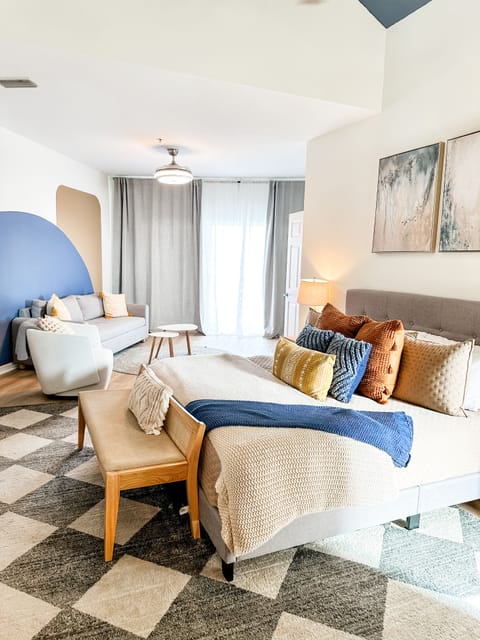 Master Bedroom with a large sitting area and a sofa bed