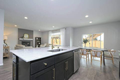 Large kitchen island with 4 barstools. 